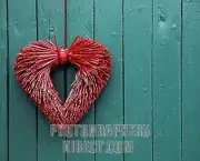 Heart made of straw , decoration on an old wooden gate , Southern Palatinate , Rhineland Palatinate , Germany , Europe